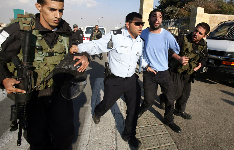 Israeli forces arrest a Palestinian at Hebrew University during a protest against Israel’s attack on Gaza, 20 November 2012