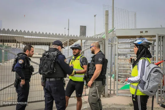 A Cycling Palestine team leader was detained by armed Israeli forces for "trespassing" during a protest ride against the Giro d'Italia cycling race
